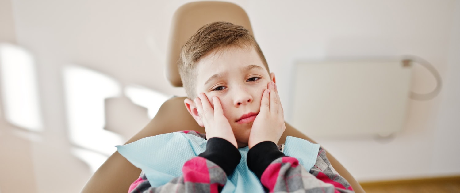 Little boy at dentist chair. Children dental.